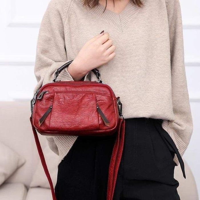 Finbjørg | Small and versatile bag in golden cognac shade