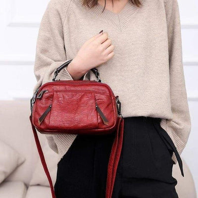 Finbjørg | Small and versatile bag in golden cognac shade