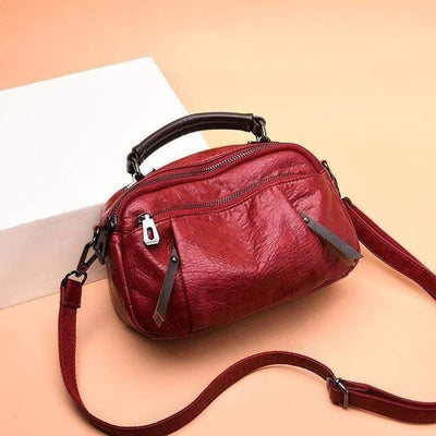 Finbjørg | Small and versatile bag in golden cognac shade