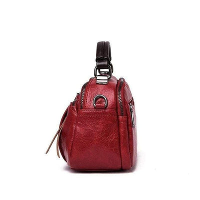Finbjørg | Small and versatile bag in golden cognac shade