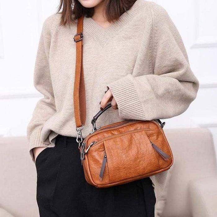 Finbjørg | Small and versatile bag in golden cognac shade