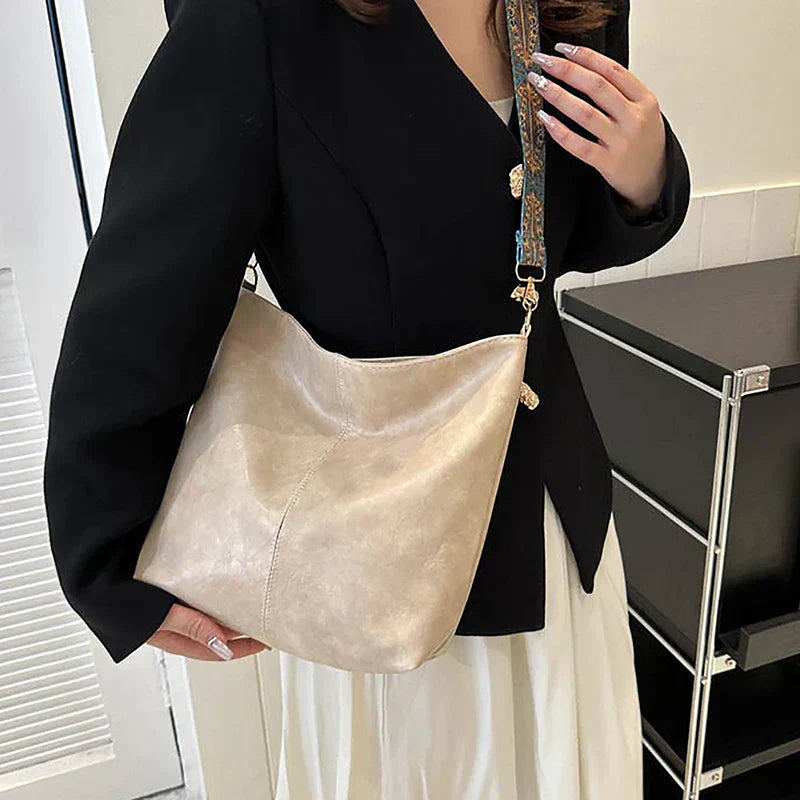 Embjørg | Classic shoulder bag with adjustable patterned strap