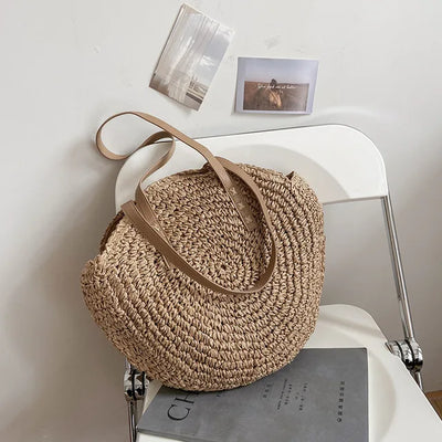 Arnora | Round braided handbag with imitation leather straps