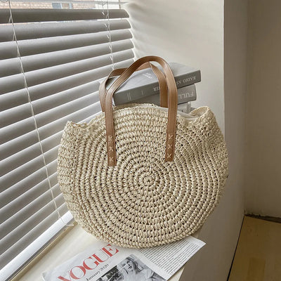 Arnora | Round braided handbag with imitation leather straps