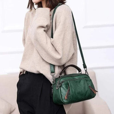 Finbjørg | Small and versatile bag in golden cognac shade