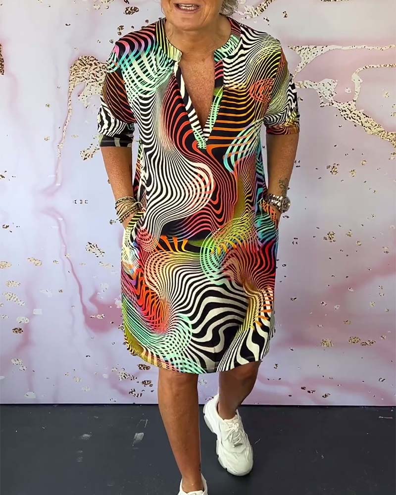 Ria™ | Colorful V-neck dress
