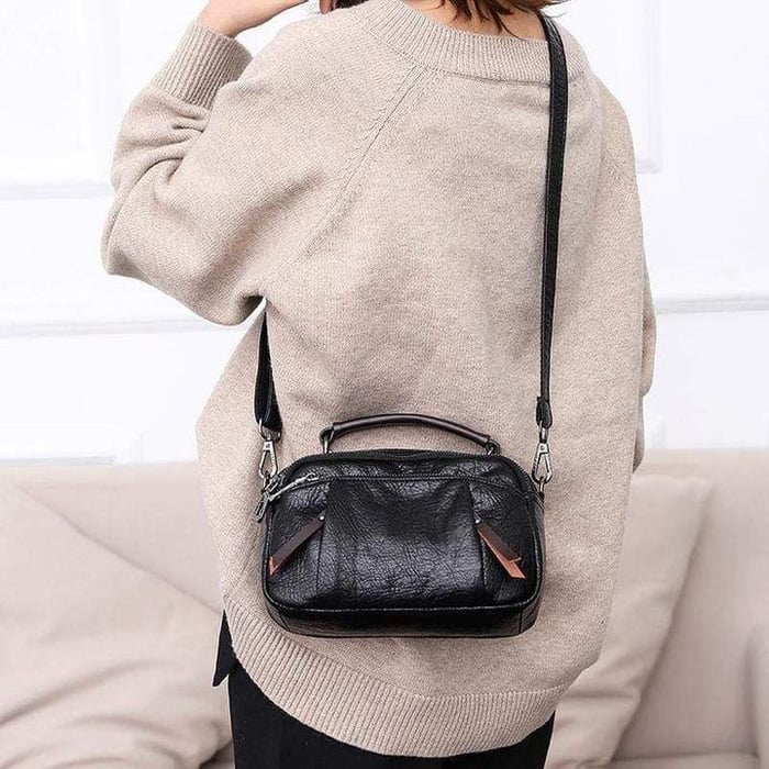 Finbjørg | Small and versatile bag in golden cognac shade