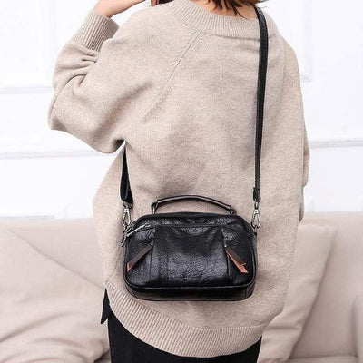 Finbjørg | Small and versatile bag in golden cognac shade