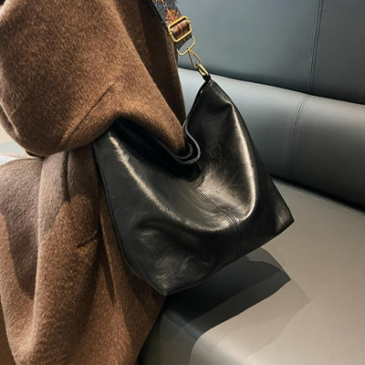 Embjørg | Classic shoulder bag with adjustable patterned strap