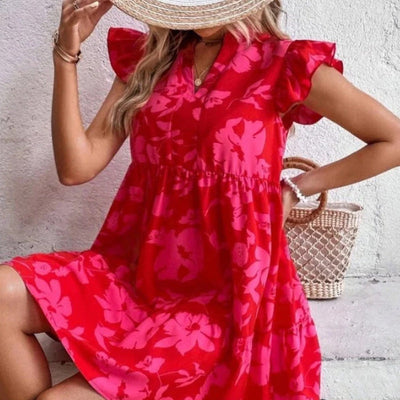 Printed dress with V-neck and ruffles on the sleeves